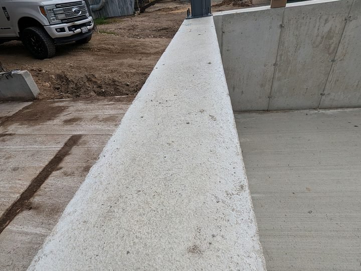 Detail of a finished concrete foundation wall